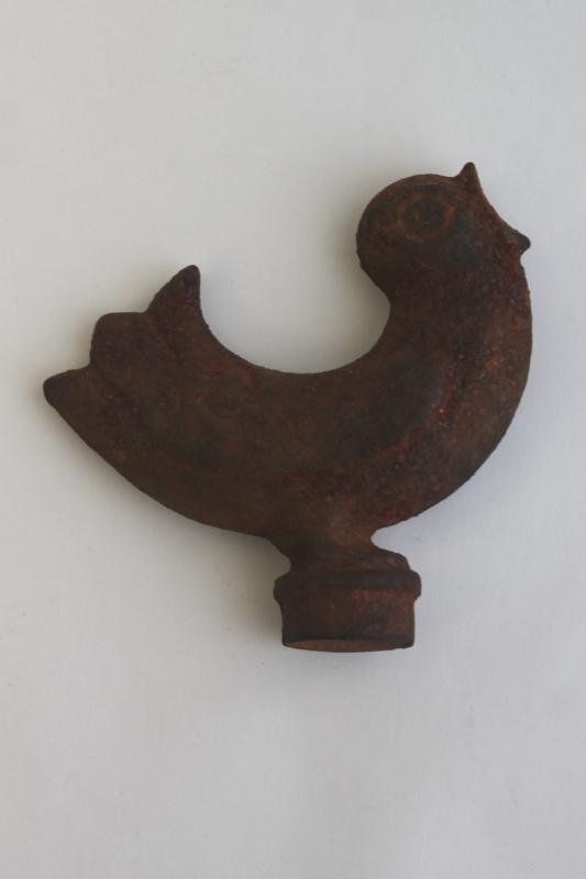 rusty old cast iron song bird, decorative finial or windmill weight