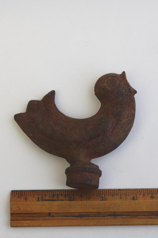 rusty old cast iron song bird, decorative finial or windmill weight