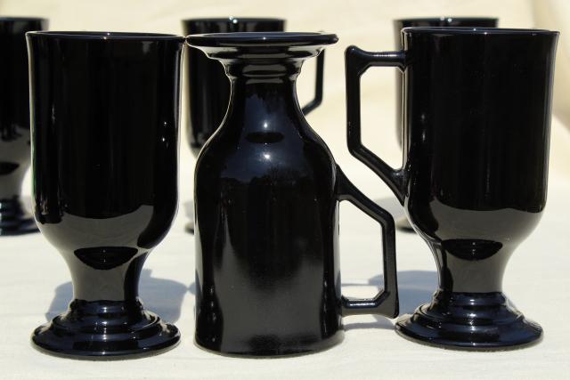 set of 8 footed cups or tall mugs, vintage black glass, Indiana Continental