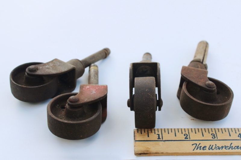 set of four antique iron wheels furniture casters vintage industrial steel hardware