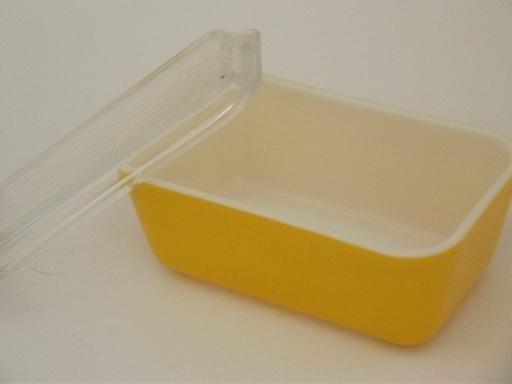 set of primary yellow vintage Pyrex glass refrigerator box containers