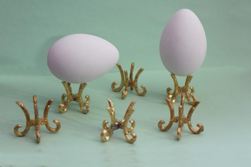 set of vintage gold tone metal egg holders, display stands for life size eggs