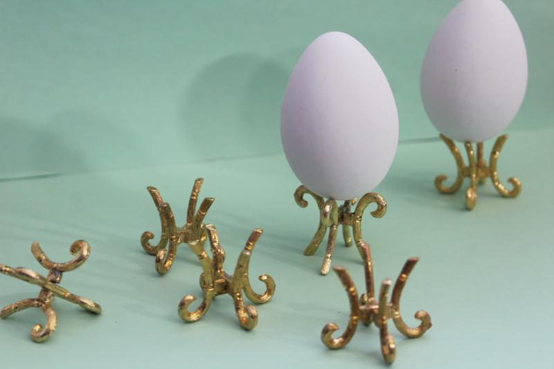 set of vintage gold tone metal egg holders, display stands for life size eggs