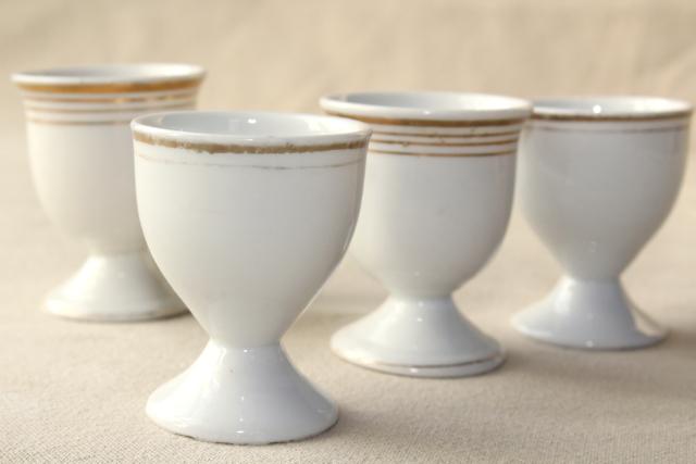 shabby antique white porcelain egg cups, mismatched vintage china set