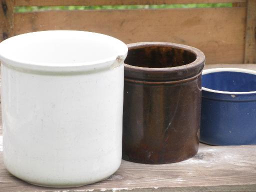 shabby old cracked stoneware crocks, plain, blue and brown for flower pots