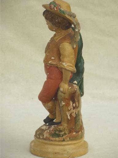 shabby vintage plaster statue, pastoral shepherd boy painted chalkware figurine