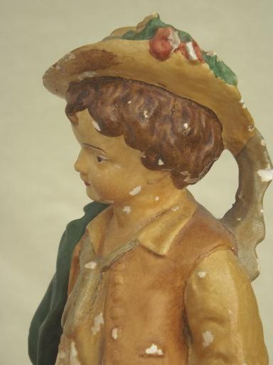 shabby vintage plaster statue, pastoral shepherd boy painted chalkware figurine