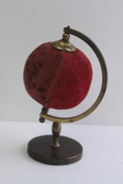 shabby vintage sewing pincushion, world globe tarnished brass frame stand