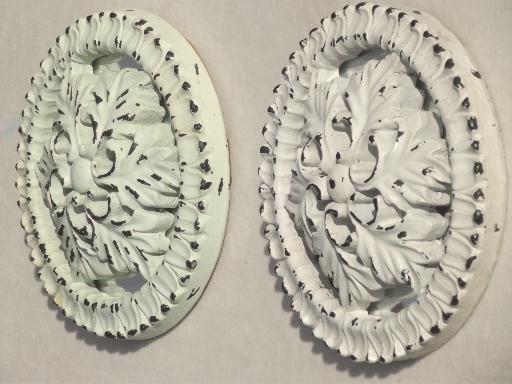 shabby white painted architectural molding ornaments, rosette medallions
