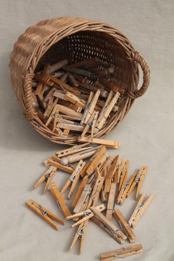 small wicker barrel shape laundry basket w/ vintage wooden clothespins