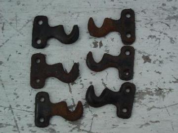 three pair of antique curtain rod mounting brackets