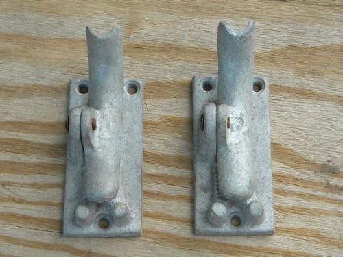 two old airstream vintage cast aluminum clothesline rope clamps
