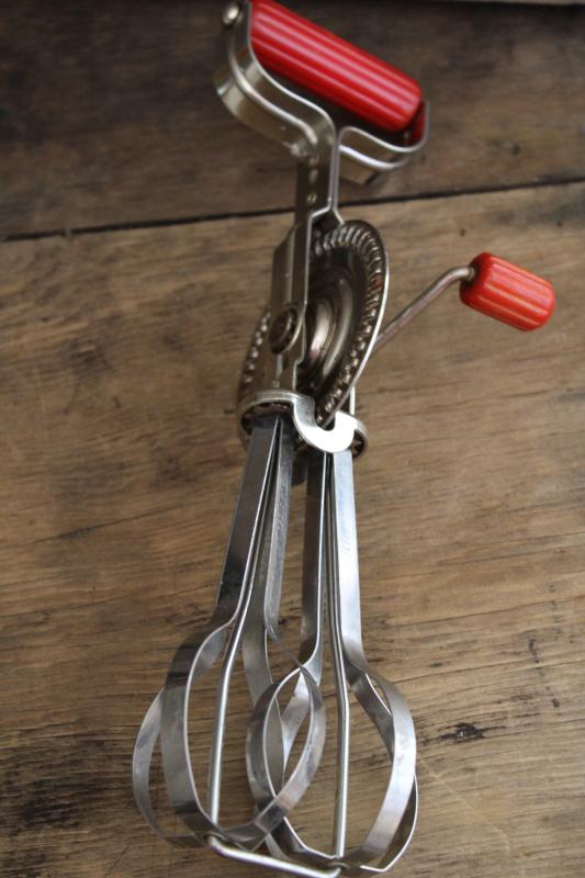 vintage Androck rotary egg beater, hand crank mixer w/ red bakelite handles