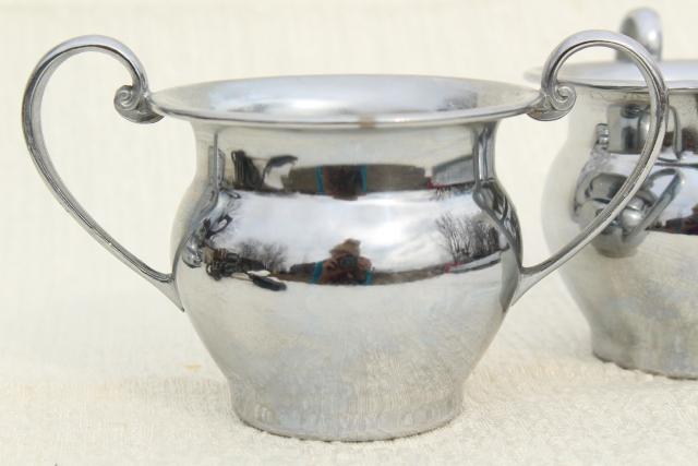 https://laurelleaffarm.com/item-photos/vintage-Farberware-deco-chrome-coffee-set-electric-percolator-pot-cream-sugar-serving-tray-Laurel-Leaf-Farm-item-no-m22822-10.jpg