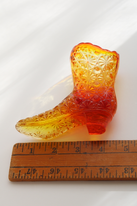 vintage Fenton daisy button pattern tall boot vase or figurine, amberina glass UV glow