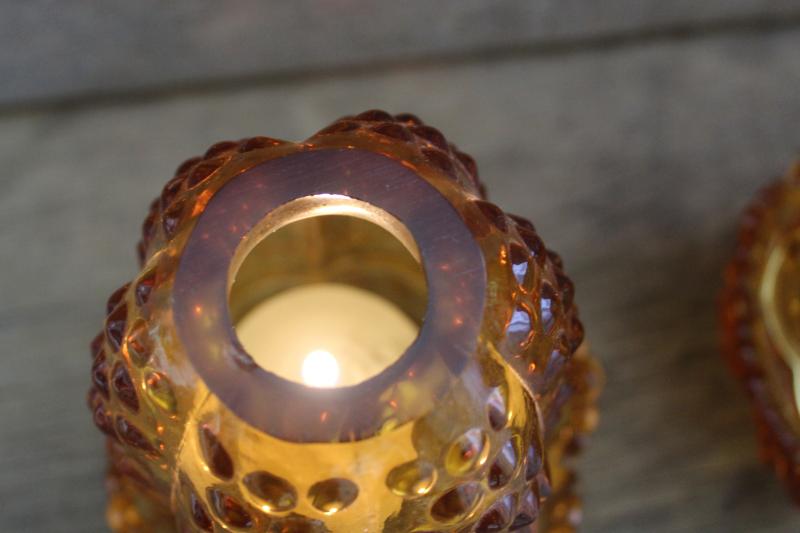 vintage Fenton fairy lights, hobnail pattern amber glass candle holders w/ shades