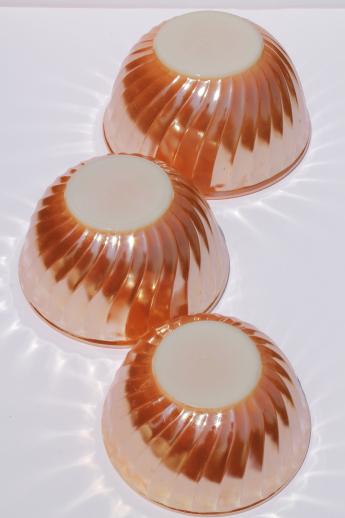vintage Fire-King peach luster glass mixing bowl nest, nesting swirl bowls