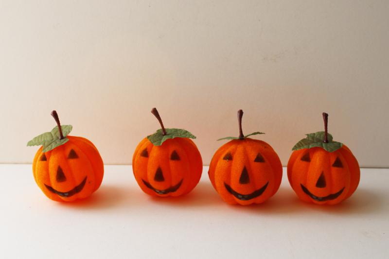 vintage Halloween decorations, flocked plastic jack-o-lantern face pumpkins