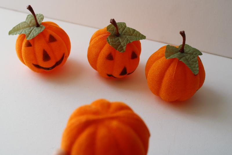 vintage Halloween decorations, flocked plastic jack-o-lantern face pumpkins