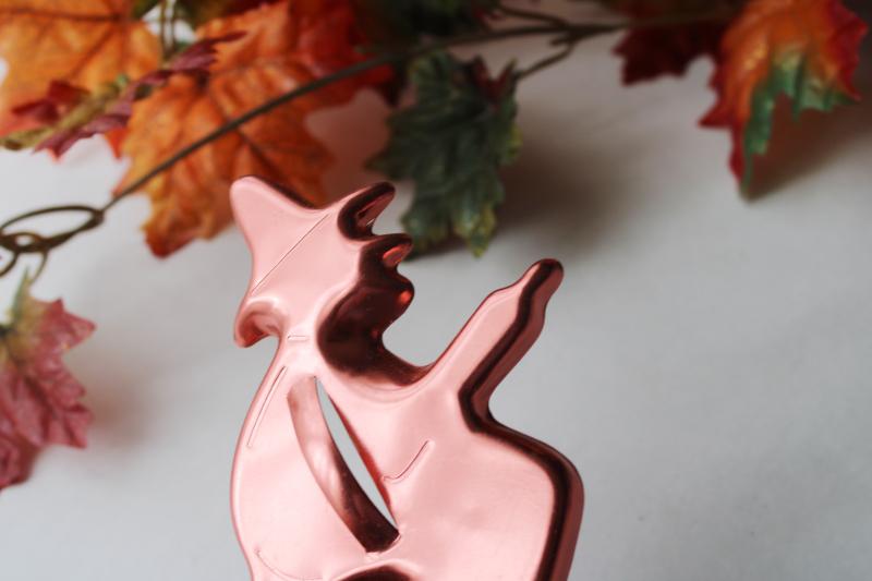 vintage Halloween witch flying broomstick, copper colored aluminum cookie cutter