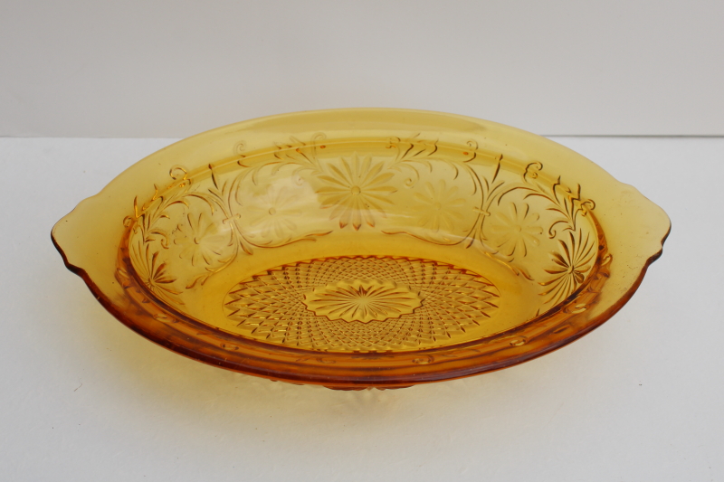vintage Indiana glass daisy pattern oval bowl, dark amber depression glass
