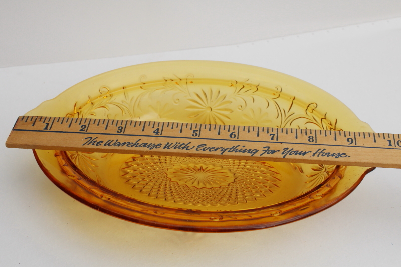vintage Indiana glass daisy pattern oval bowl, dark amber depression glass