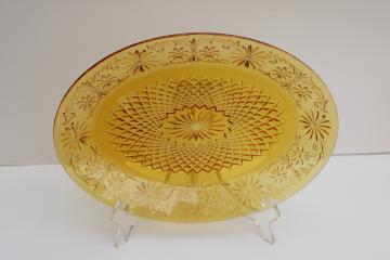 vintage Indiana glass daisy pattern oval platter, dark amber depression glass