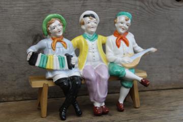 vintage Made in Japan hand painted figurine, jolly sailors band shelf sitter w/ wood bench