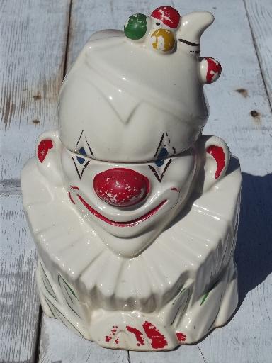 vintage McCoy pottery cookie jar, white glaze clown w/ handpainted face