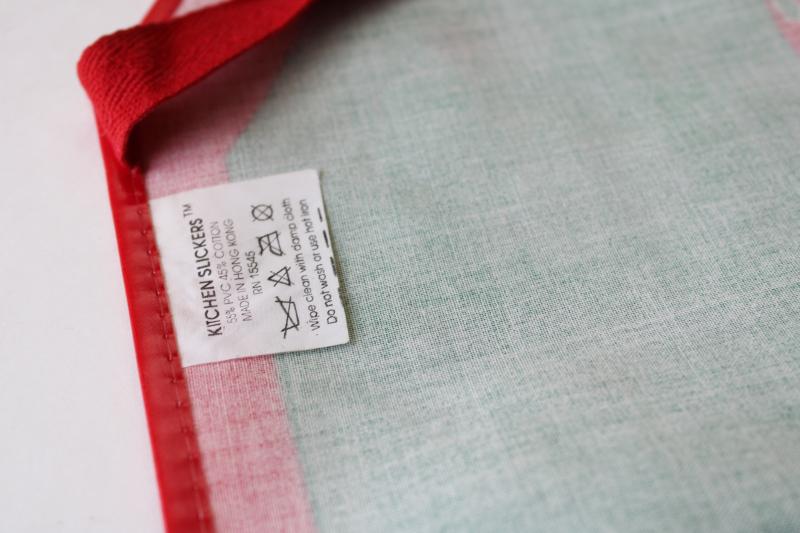 vintage Merry Christmas oilcloth type fabric apron, wipe clean bib apron 