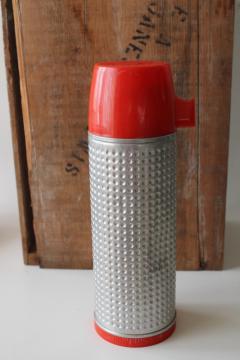 vintage Thermos bottle, textured aluminum w/ red plastic cup, retro camp style