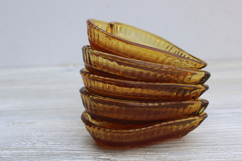 vintage Tiara sandwich daisy pattern amber glass heart shaped trinket dishes or ashtrays