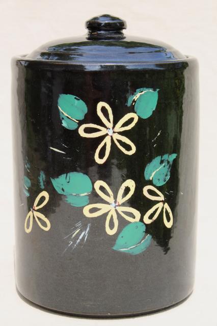 vintage USA pottery stoneware crock cookie jar, glossy black w/ folk art flowers
