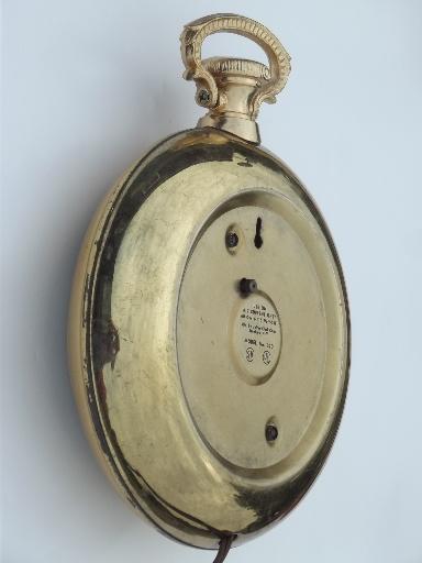 vintage United electric pocket watch wall clock, metal w/ convex glass