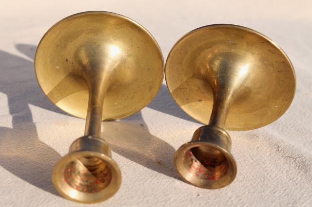 vintage brass candlesticks set in graduated heights, minimalist mod candle holders