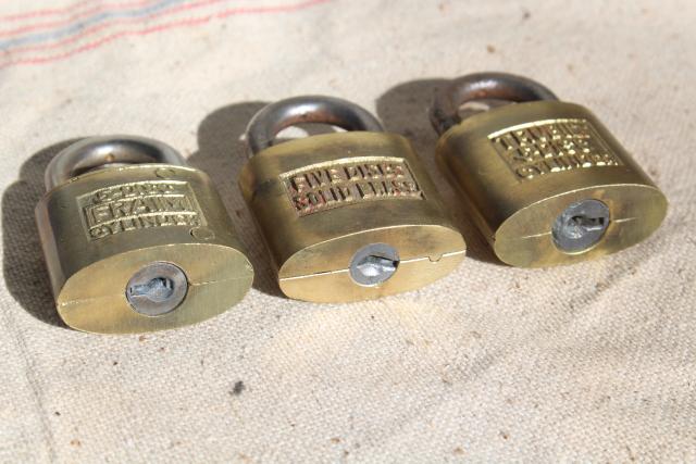 vintage brass padlocks, old five disc cylinder locks Fraim & Trubilt