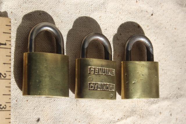 vintage brass padlocks, old five disc cylinder locks Fraim & Trubilt