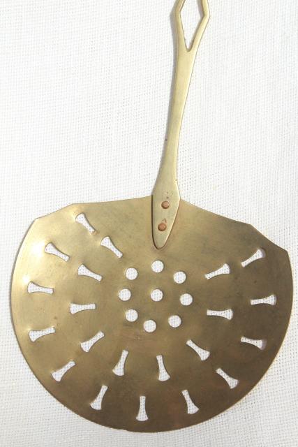 vintage brass skimmer, long handle strainer spoon, fireplace hearth or kitchen tool