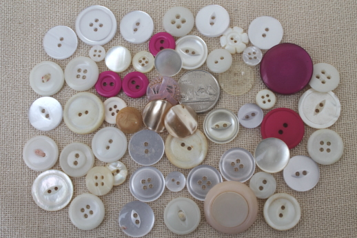 vintage buttons collection, old glass barrel jar full of buttons of all kinds