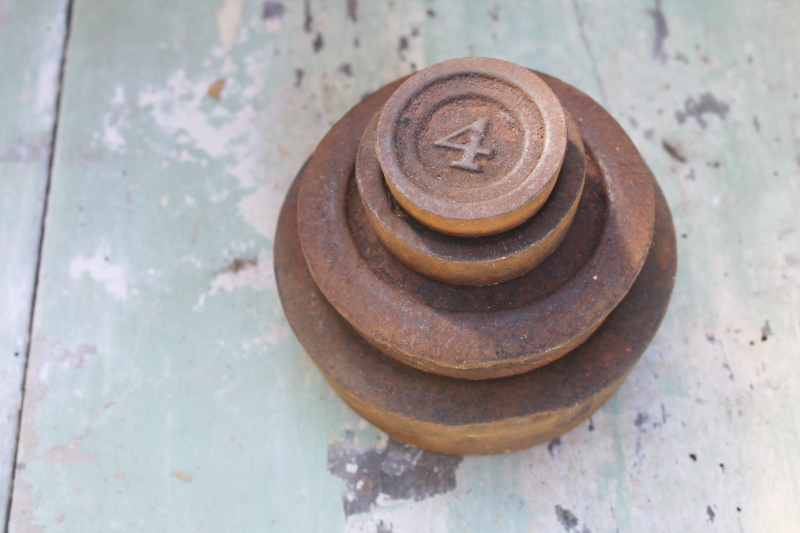 vintage cast iron scale weights, antique numbered graduated rounds