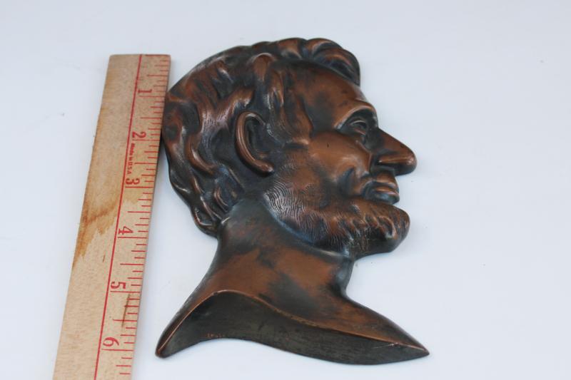vintage cast metal bronze bust of Lincoln, profile relief coin art portrait
