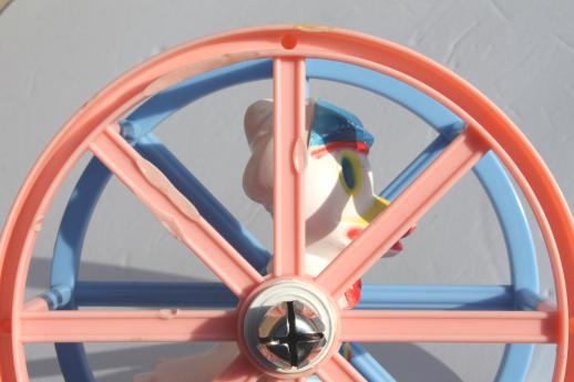 vintage celluloid plastic baby toy, sailor duck spinner wheel rolling push toy