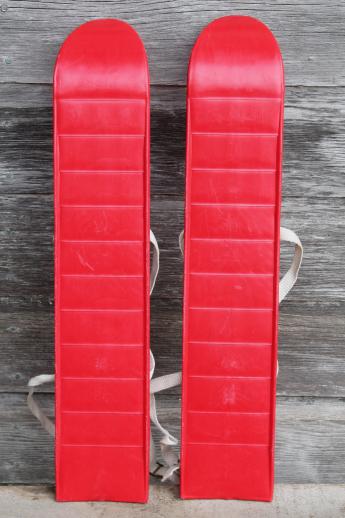 vintage child's size skis, red plastic mini-ski set w/ poles, winter sport toy