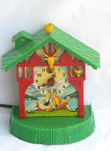 vintage child's swiss chalet electric clock w/litho Heidi graphics