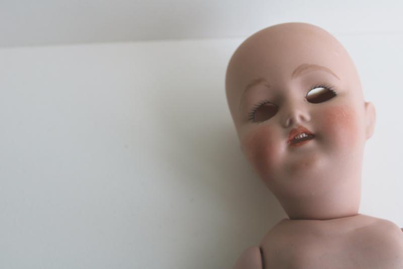 vintage china doll, antique reproduction open mouth w/ teeth, no eyes or wig