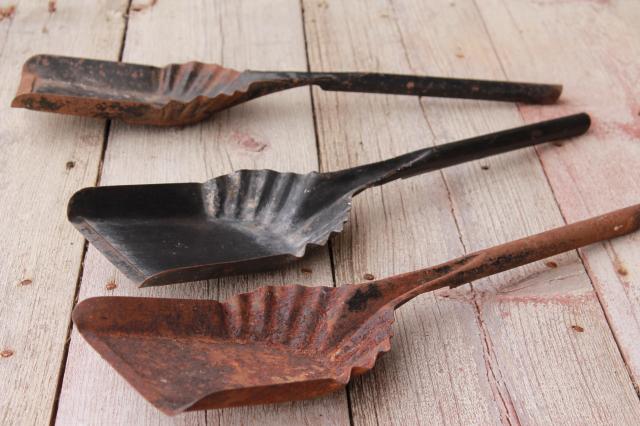 vintage coal shovels, metal scoops for stove scuttles, collection of old tools primitive wall decor