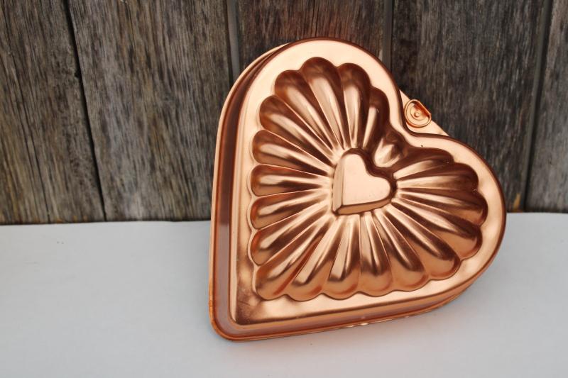 vintage copper colored aluminum heart shaped jello mold or cake pan, kitchen wall hanging
