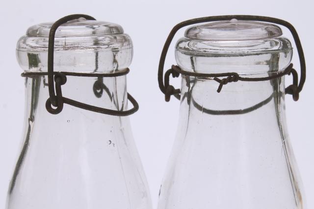 https://laurelleaffarm.com/item-photos/vintage-cream-or-milk-bottles-old-halfpint-bottle-wire-bail-glass-lids-Laurel-Leaf-Farm-item-no-nt8347-10.jpg