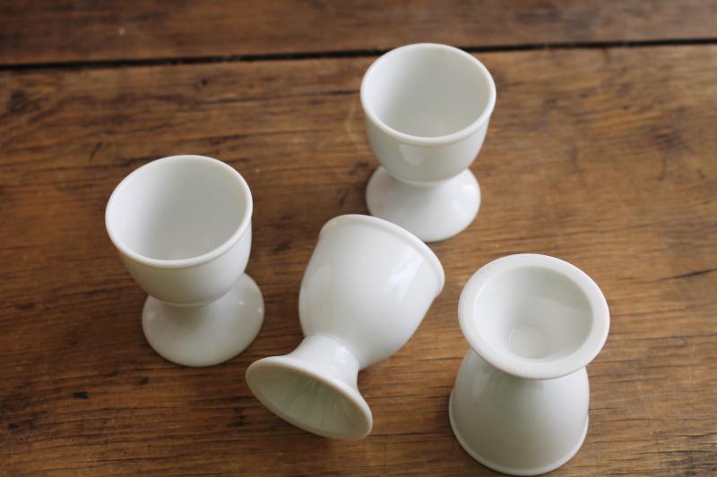 vintage egg cups set of four, pure white porcelain china w/ classic shape