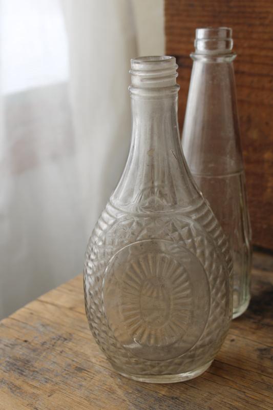 vintage embossed glass bottles, condiment sauce jars, old dug bottle collection